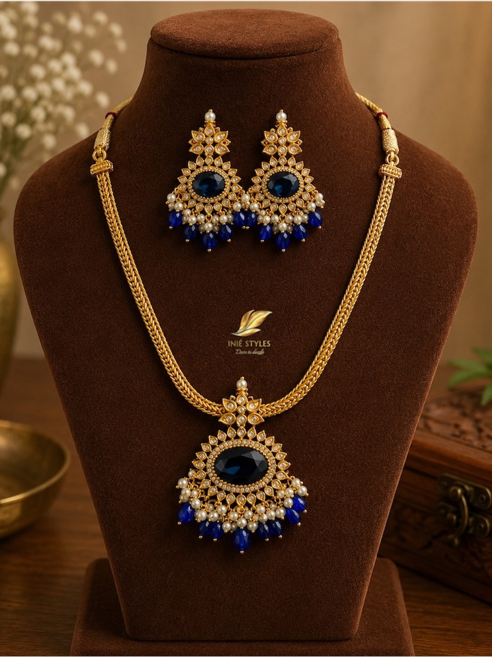 Gold-finish Attigai type Necklace Set with Royal Blue Stones